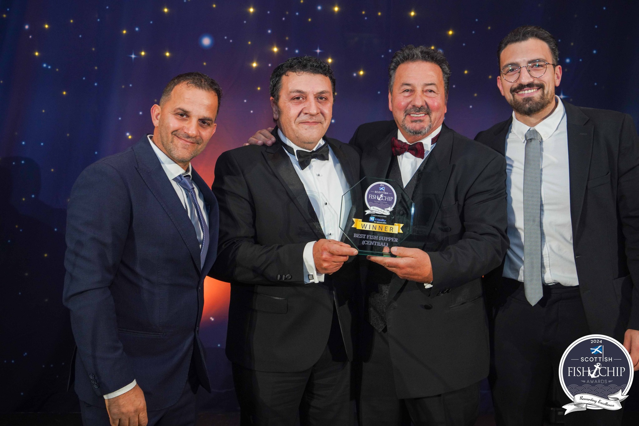 Vincenzo receiving an award