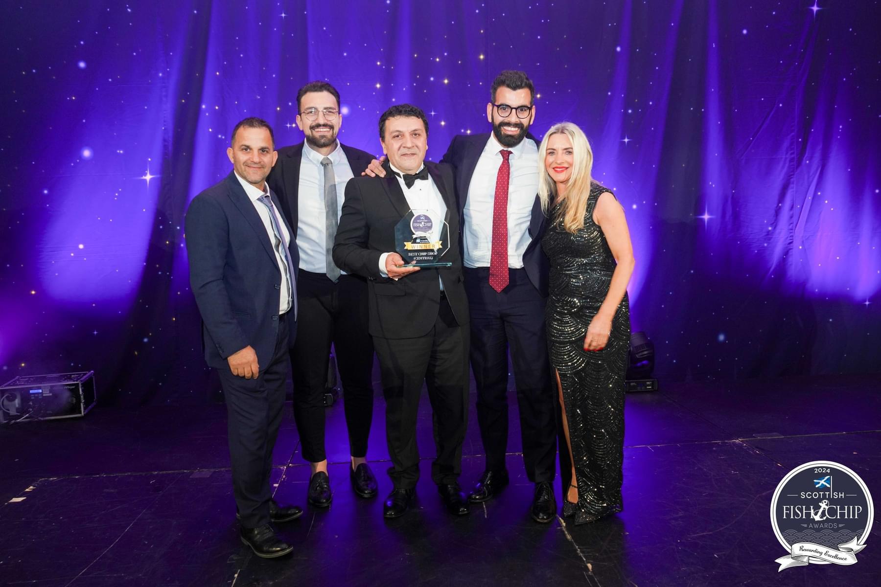 Vincenzo receiving an award