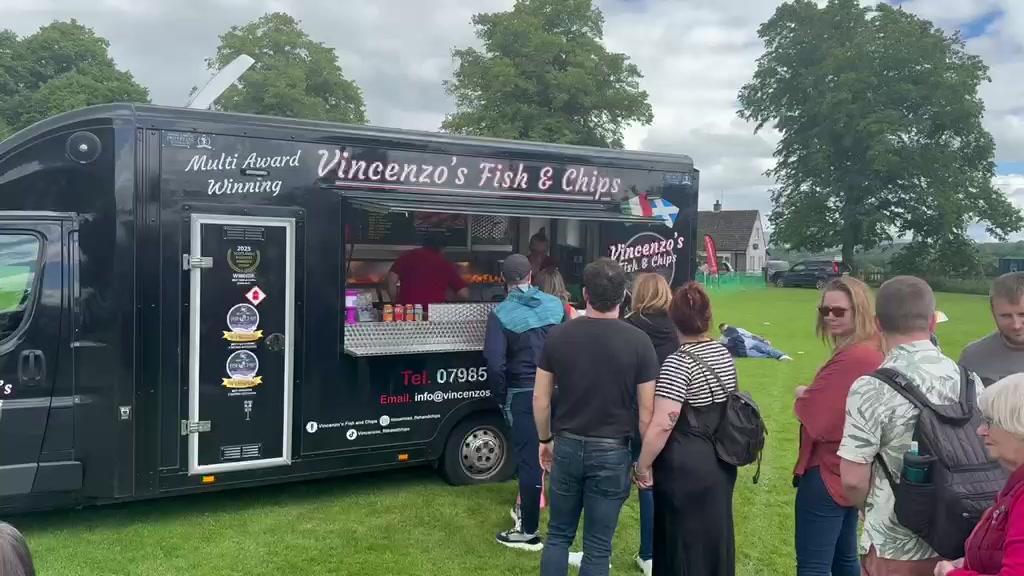 The real little black van at an event